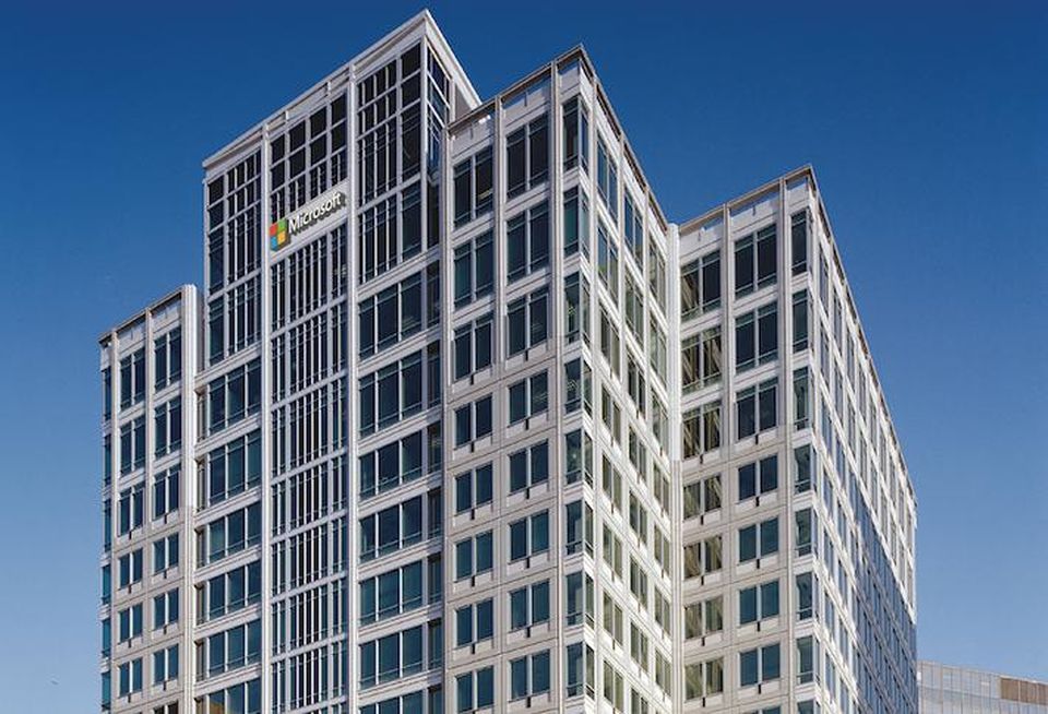 The 1300 Wilson Blvd. office building, including a rendering of the planned Microsoft logo.