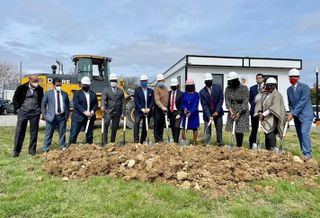 D.C. officials and development partners celebrating the groundbreaking of 88 townhouses at St. Elizabeths East, Tuesday March 23. 