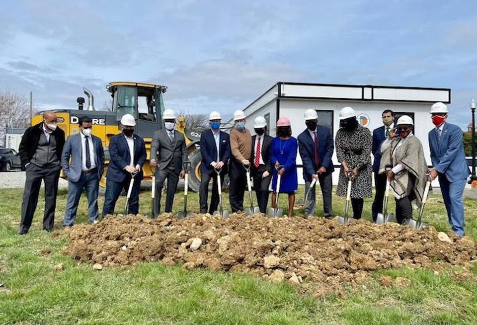 D.C. officials and development partners celebrating the groundbreaking of 88 townhouses at St. Elizabeths East, Tuesday March 23.