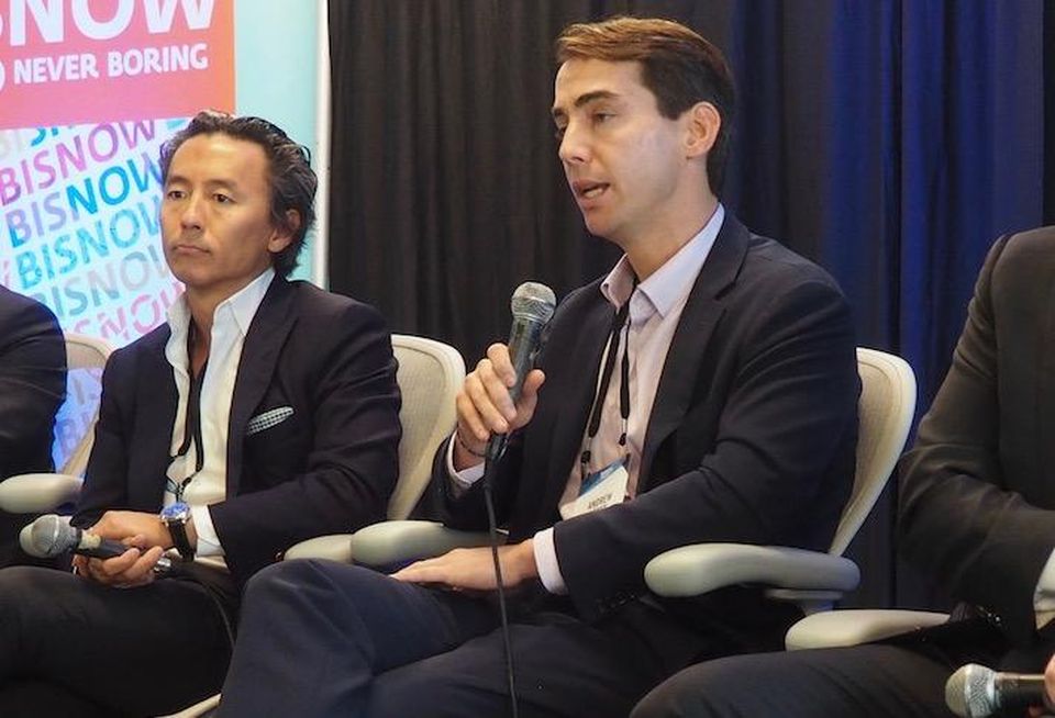 Morning Calm Management's Mukang Cho and WashREIT's Andrew Leahy at a 2018 Bisnow event