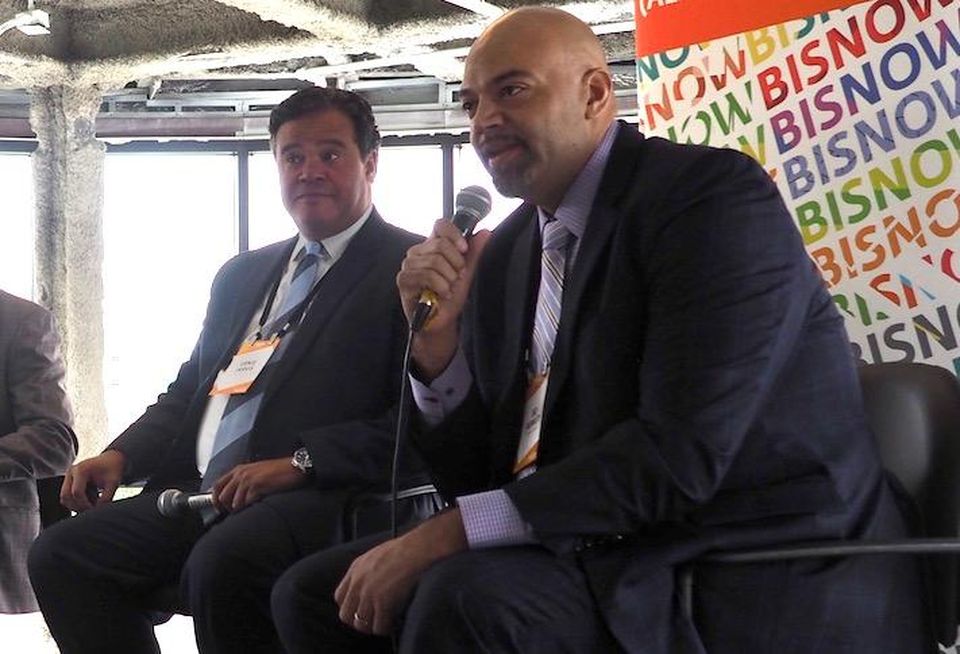 Jarvis Commercial Real Estate's Ernie Jarvis and Menkiti Group's Bo Menkiti, speaking at a June Bisnow event