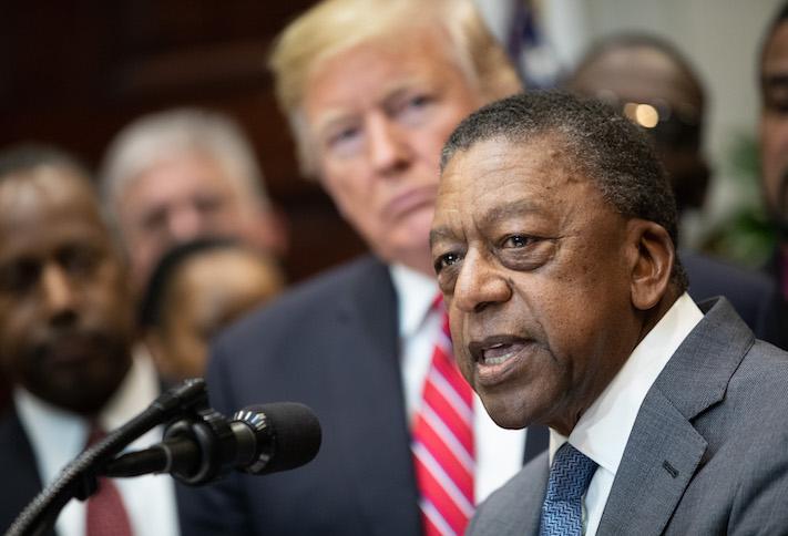Bob Johnson, the founder of Black Entertainment Television and RLJ Lodging Trust, speaking at the White House with then-President Donald Trump in December 2018. 