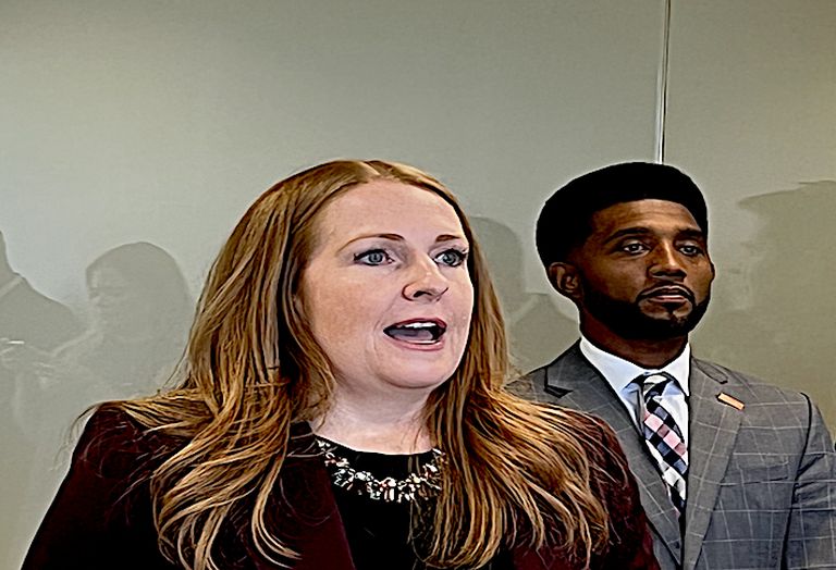 Jennifer Curry, Baker Donelson managing shareholder and Baltimore Mayor Brandon Scott during Oct. 11, 2022 news conference. Curry announces the donation of Baker Donelson's 23rd floor office space at 100 Light St.