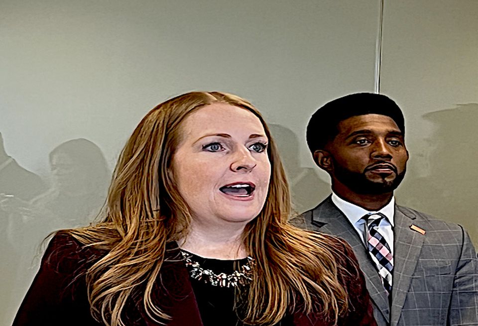 Jennifer Curry, Baker Donelson managing shareholder and Baltimore Mayor Brandon Scott during Oct. 11, 2022 news conference. Curry announces the donation of Baker Donelson's 23rd floor office space at 100 Light St.