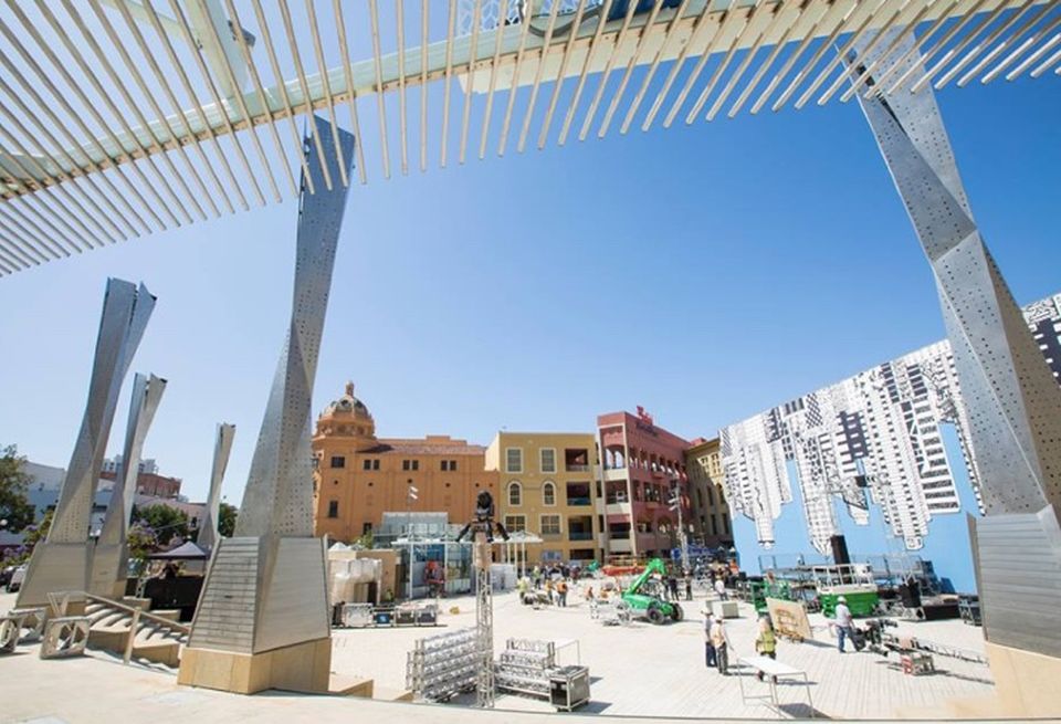 Workers preparing for the Horton Plaza Park reopening celebration.