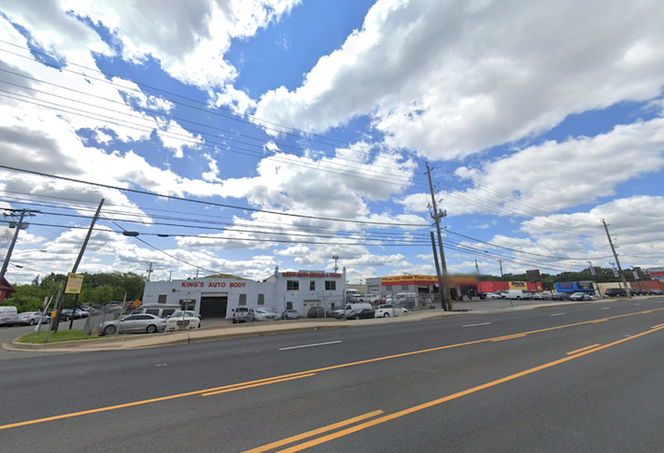The intersection of St. Barnabas and Cremen roads, slated for a multifamily development, is currently occupied by an automotive shop.