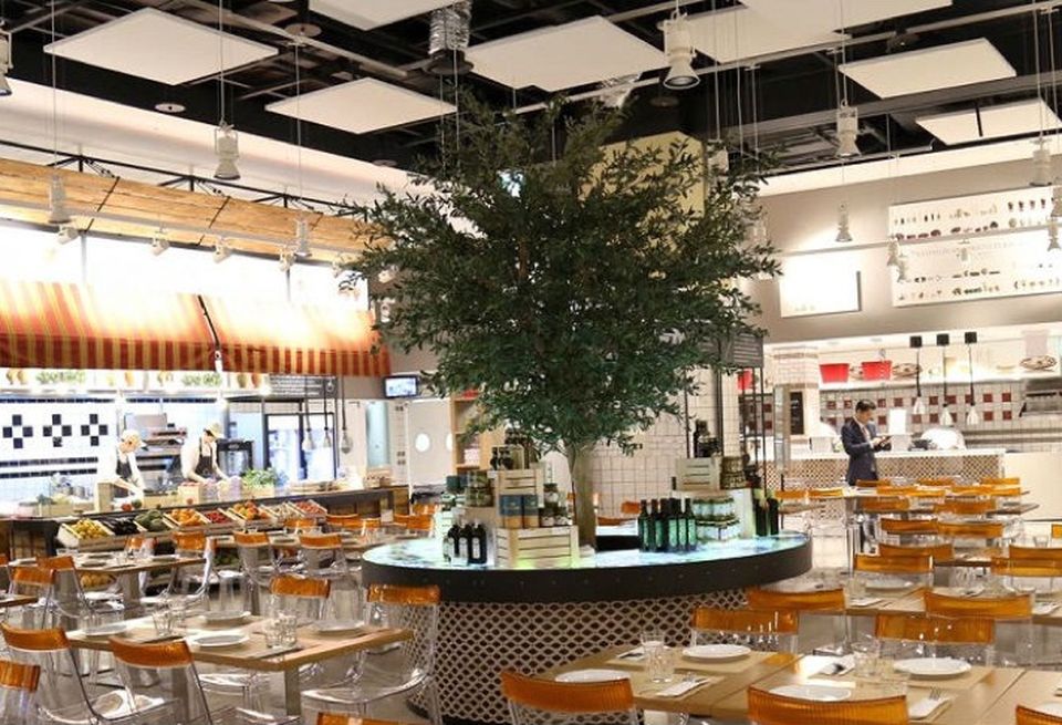 The 21k SF Eataly in Seoul, Korea, is typical of specialty grocerants, offering a cafe, restaurant and counter service, along with a selection Italian-oriented groceries and home goods, as well as cooking classes.