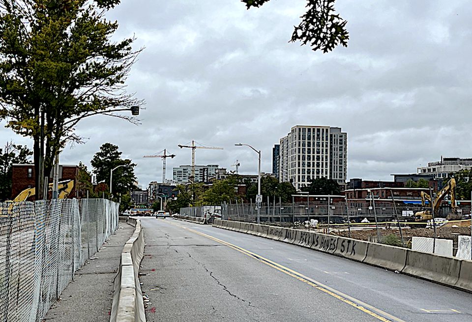 Demolition work on Perkins Homes continued in early October 2022. Looking to the south l along South Caroline Street cranes are at work on the Harbor East skyline.