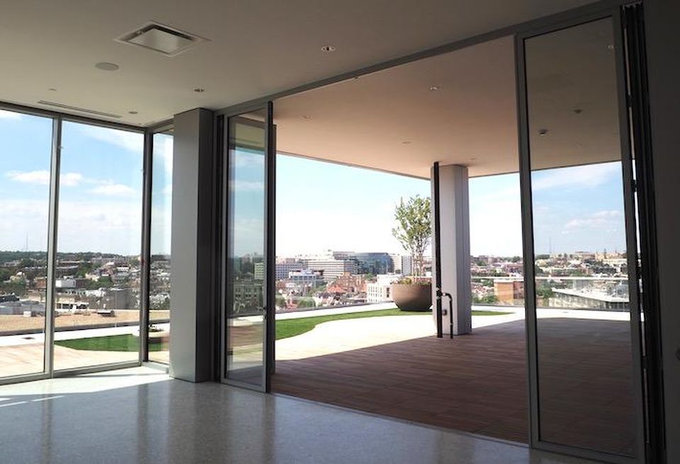 The indoor-outdoor rooftop amenity space at Meridian Group's 1333 New Hampshire Ave. NW. 