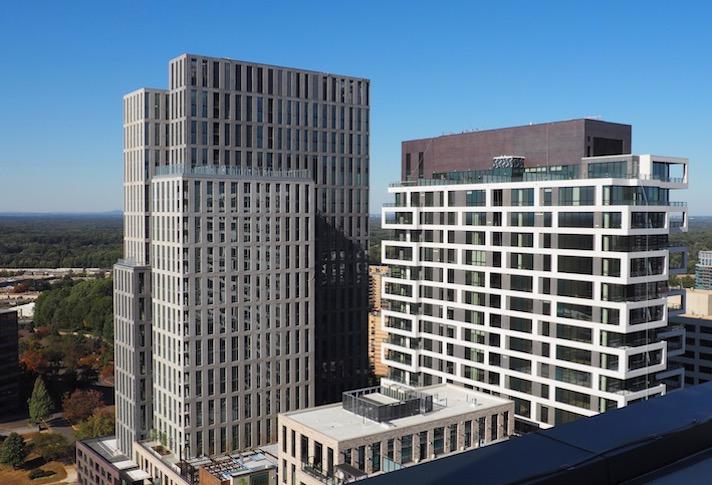 The high-rise apartment and condo towers that delivered at The Boro in Tysons in late 2019. 