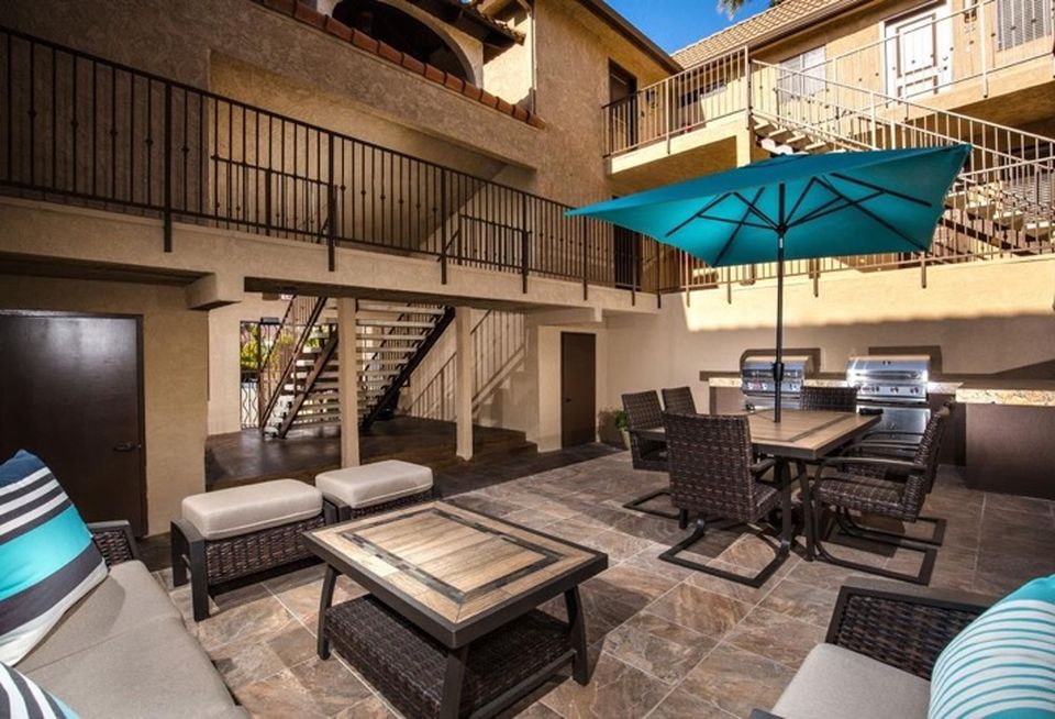 Renovation of The Stanley Multifamily complex in SD's South Park includes luxury community features, like this courtyard BBQ area.