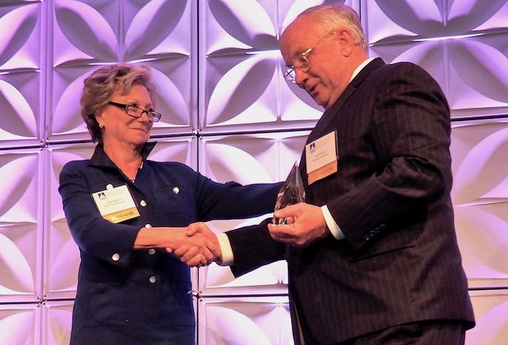 Boston Properties' Ray Ritchey accepting the Joseph Stettinius Jr. Leadership Award from last year's winner, Rand Construction's Linda Rabbitt