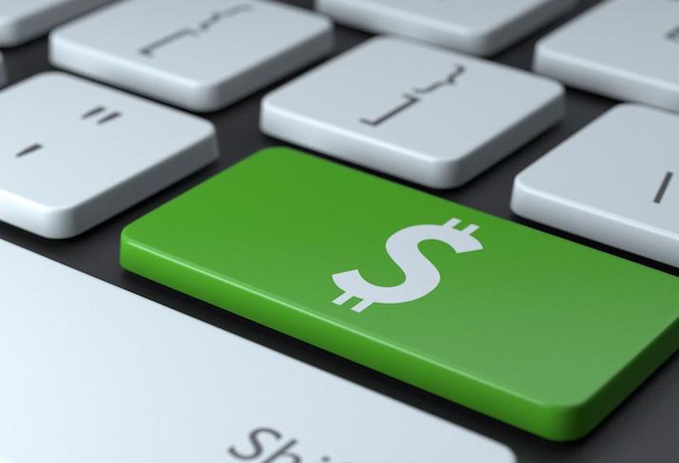 dollar sign money laptop keyboard