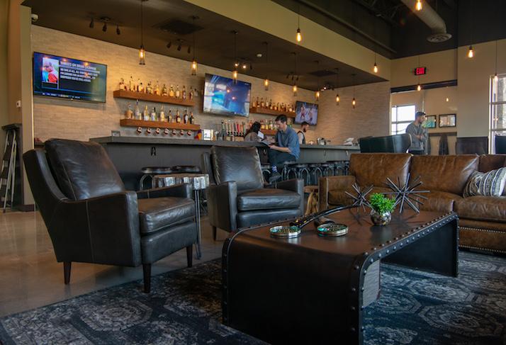 The bar and lounge area in Scissors & Scotch's Overland Park, Kansas location. 