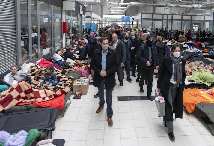 A delegation including U.S. Secretary of State Antony Blinken and Polish Foreign Minister Zbigniew Rau visiting a Ukrainian refugee reception center in Poland on March 5. 