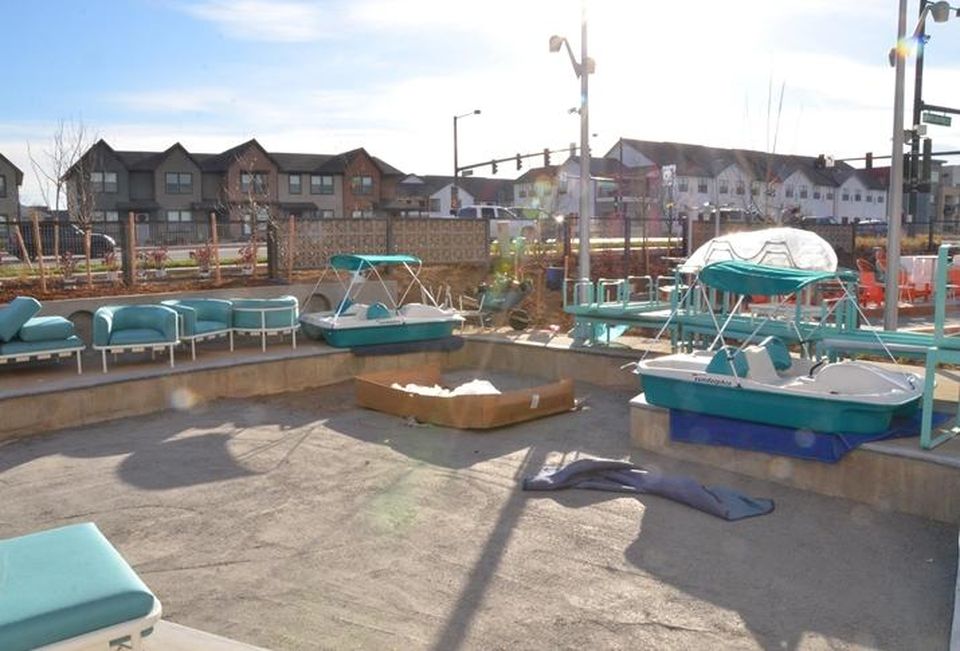 The astropool, seen here under construction, will be lined with blue astroturf.