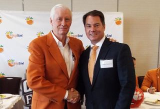 Steven McCraney (right) with Edgar C. Jones Jr., past Orange Bowl president