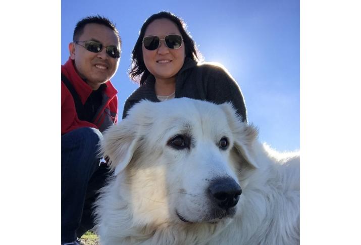 Colliers senior vice president John Nguyen with wife, Kathryn, and dog, Simba