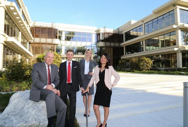 Charles Dunn team at 150 North Orange Grove Blvd. property which sold to Doheny Eye Institute - from left to right: Bill Boyd, Scott Unger, Lauren Nesmith, and Linda Lee. 
 
