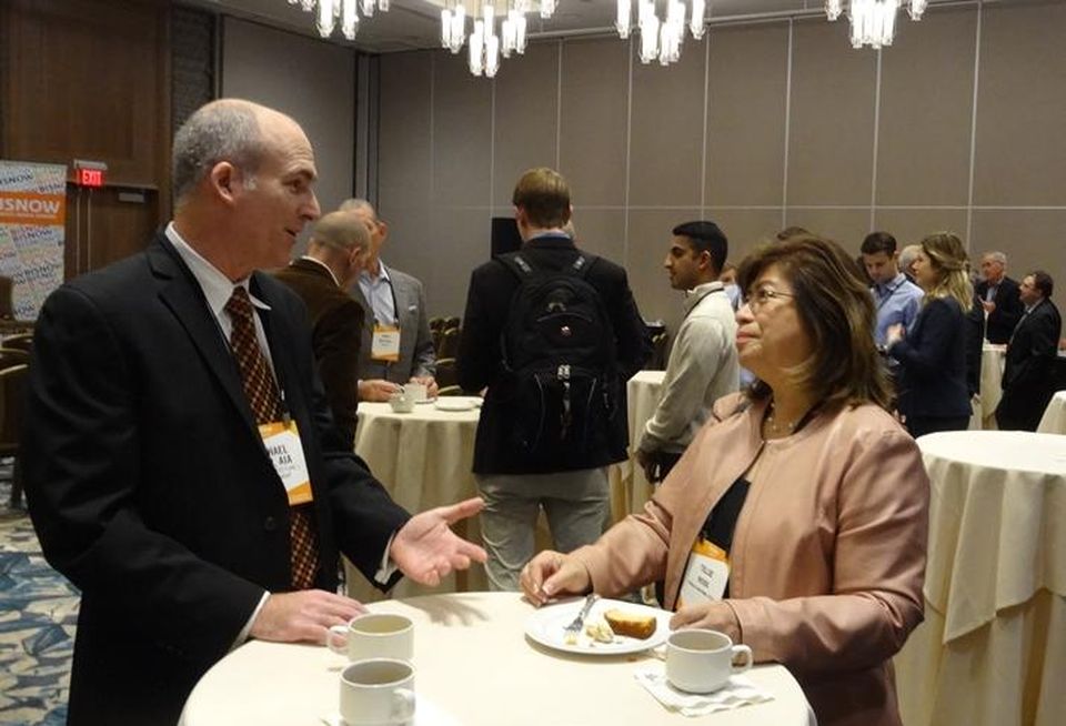 Attendees network at Bay Area Capital Markets and Real Estate Finance