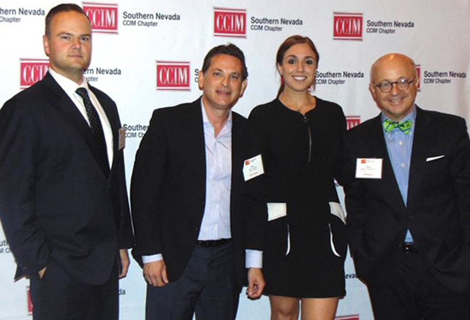 From left, Snell & Wilmer's Kade Miller and Marc Schultz, Natalie Wainwright and DV Financial Services's James D. Howard Jr .