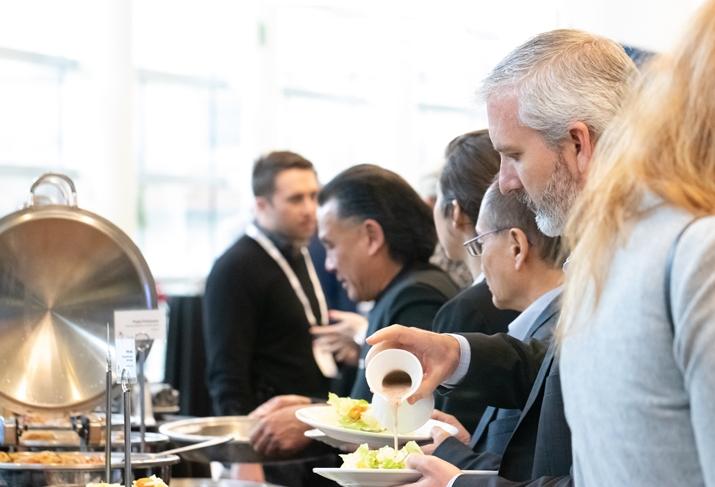 Attendees eat lunch at DICE West. Attendees eat lunch at DICE West.