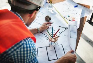 construction blueprints worker