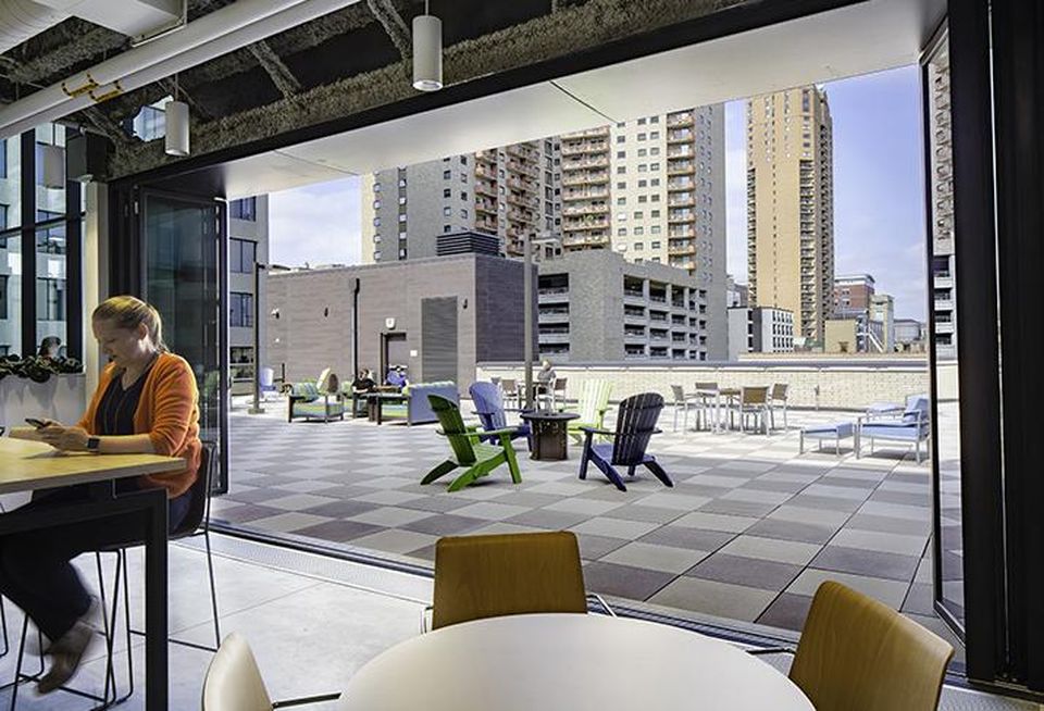 The 428 building in St. Paul, MN, recently earned LEED Silver and WELL Gold certifications. I’ve attached a project sheet for it as well. The images show the building’s roof top, which houses patios and an annex of occupiable space intended for collaborative working, with floor-to-ceiling glass, that provides a biophilic connection to nature for those utilizing the space. Photo credit for the project images is as follows:Photo courtesy of HDR © 2018 Kirk Monpas