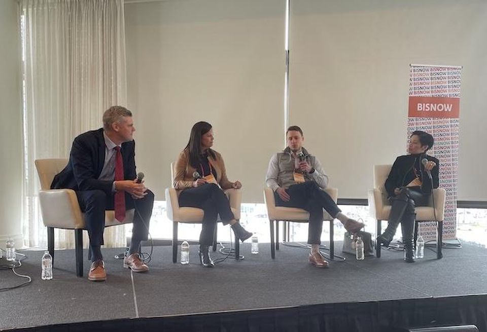 HYM Investment Group's John Hurley, Bozzuto Construction Co.'s Kelly Cantly, Nuveen Green Capital's Arran Cooper and Athena International Capital's Tinchuck Ng at Bisnow's April 2022 Boston Construction & Development event.