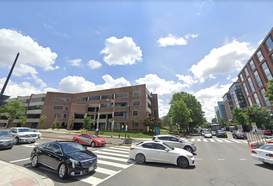 The 9th Street and Maine Avenue SW intersection, with the former USDA building on the left and The Wharf on the right.