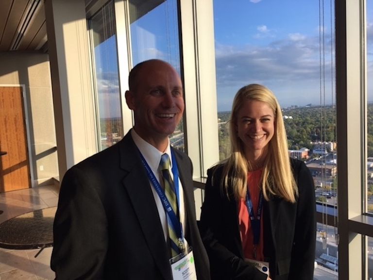 Scott Caldwell of Lincoln Property Co. with Bisnow's Jenna Bruce at Colorado Center Tower 3 during NAIOP Southeast Suburban Denver property tour