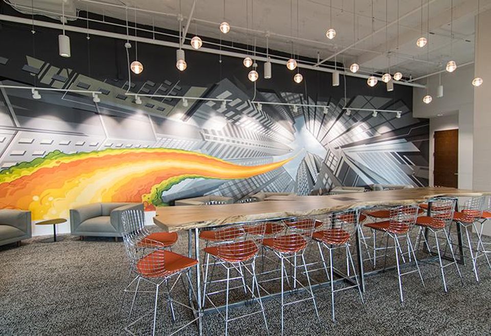 The lobby of 300 South Brevard includes soft seating and meeting spaces.