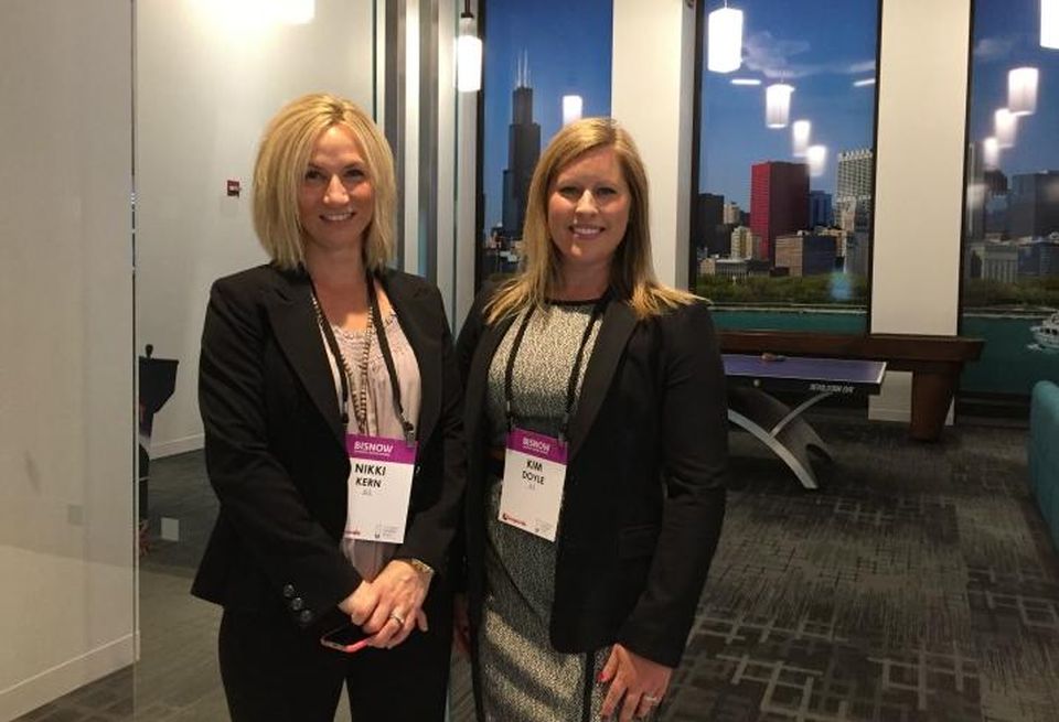 JLL EVP Nikki Kern (left) and Associate Kim Doyle, pictured in front of 222 South riverside's newly rehabbed amenity space.