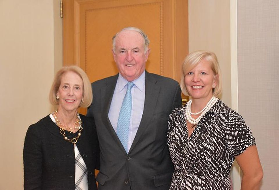 Kevin Phelan with his wife, Anne, left and assistant, Judi Lambert