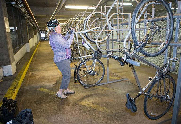 Christine Weber stores her bike at Bank of America Financial Center