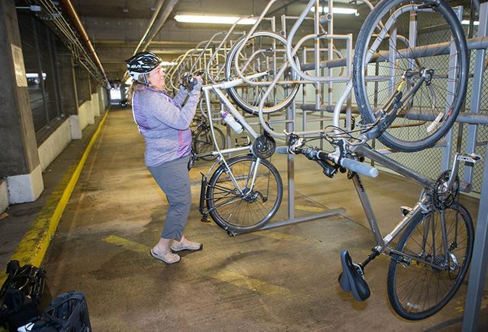 Christine Weber stores her bike at Bank of America Financial Center