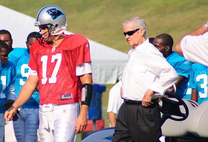 Jerry Richardson, right, walks with Jake Delhomme during Carolina Panther's Training Camp at Wofford College in Spartanburg, S.C., in 2009.