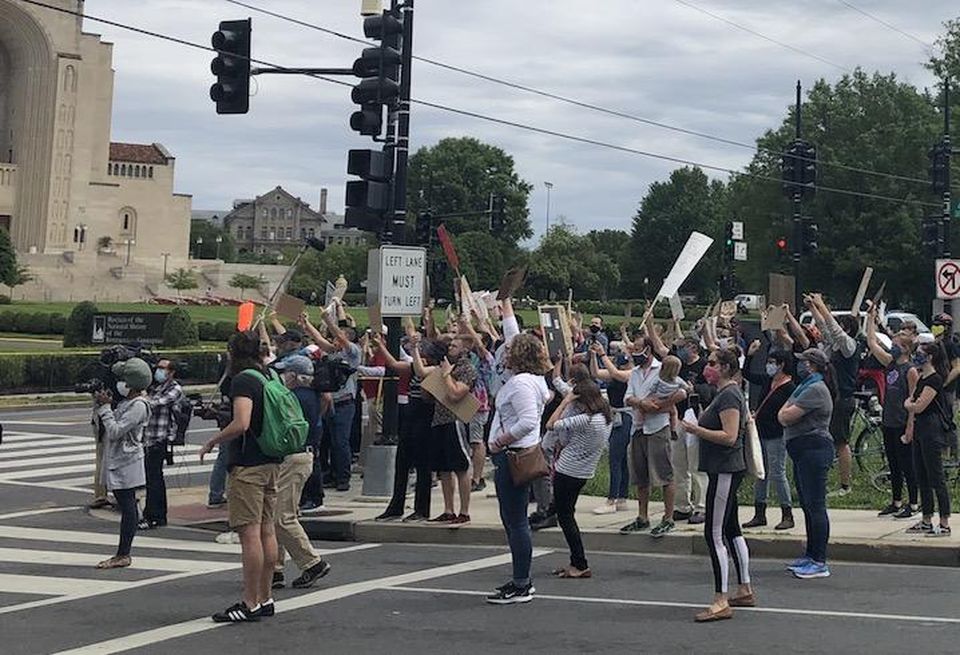 Protestors gathered Tuesday in Northeast D.C.'s Brookland neighborhood ahead of President Donald Trump's appearance at a nearby church.