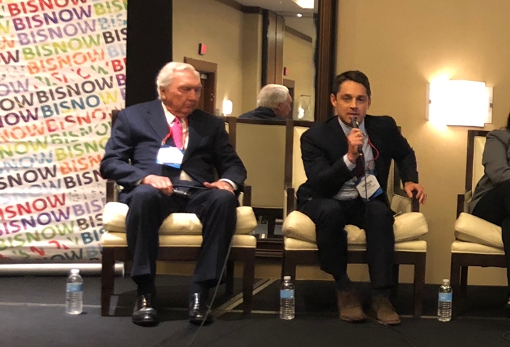 Johnson Development Founder, Chairman and CEO Larry Johnson, and Lionstone Investments Head of Acquisitions Andrew Lusk.
