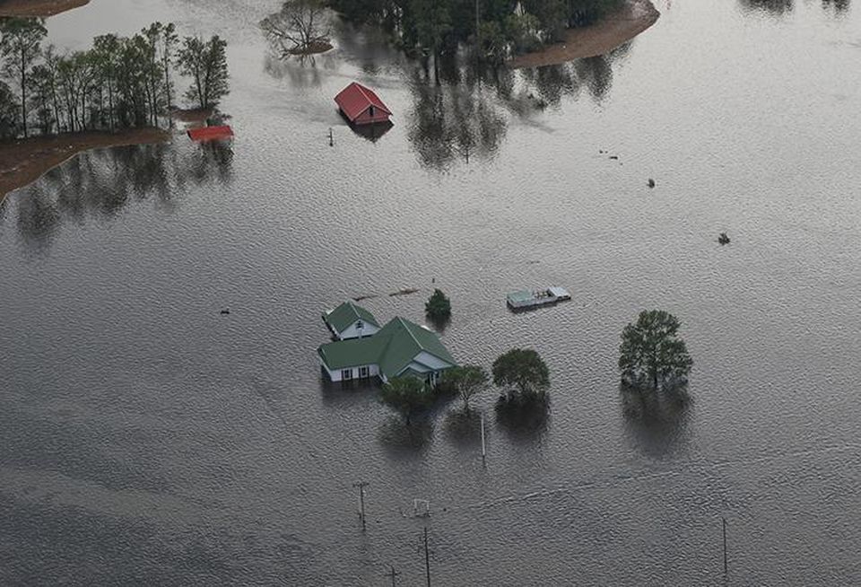 Aviators with the North Carolina Detachment 1 Bravo Company, 2nd 151st Aviation Regiment conduct aerial search missions from a UH-72A Lakota Light Utility Helicopter on Monday. The support and security crew scanned homes and structures for individuals in distress, focusing efforts along the Cape Fear river including the North Carolina areas of New Bern, Wilmington, and Lumberton.