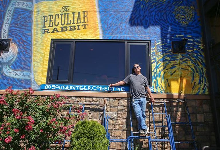 The Peculiar Rabbit owner Rob Nixon has a mural on the side of his restaurant created by Southern Tiger Collective. It serves as a way to work around the City of Charlotte's sign ordinance.
