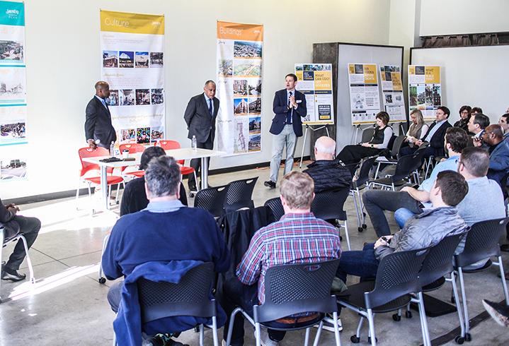 Charlotte City Planning Director Taiwo Jaiyeoba, visiting planning expert Mitchell Silver and Crescent Communities President of Commercial and Mixed Use Brian Leary speak to community members at a Unified Development Ordinance meeting.  