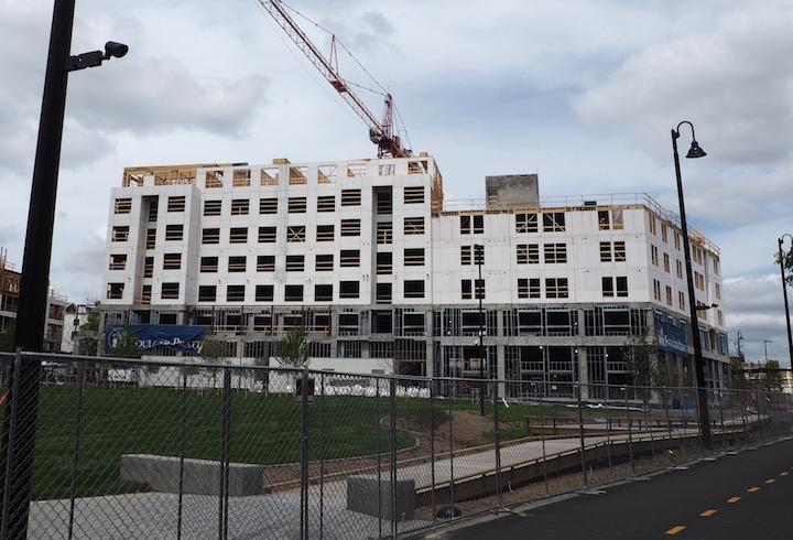 The Eckington Park development next to the fenced-off Tanner Park along the Metropolitan Branch Trail. 