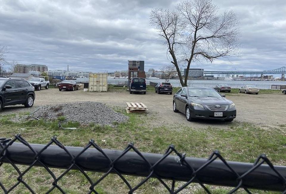 The parking lot on the 102 Border St. site, which has been restricted from development due to the DPA designation.