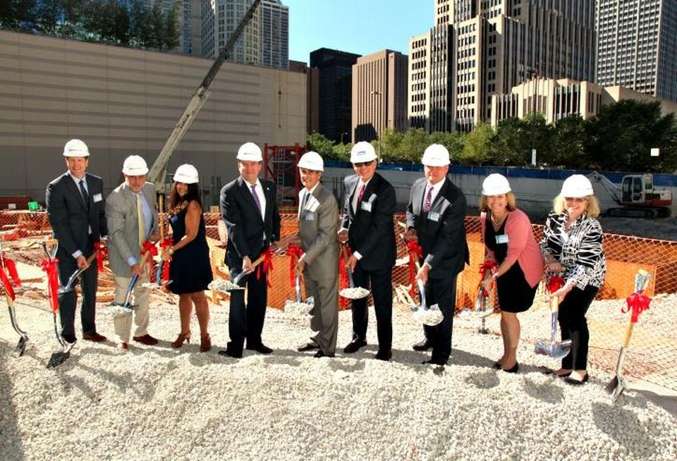 Metlife director Matt Sharples; Jupiter Realty EVP Jerry Ong; Chicago Building Commissioner Judy Fryland; Ald. Brendan Reilly; Jupiter Realty chairman/CEO Don Smith; Jupiter Realty president/CFO Michael Pompizzi; Allstate head of commercial real estate investments Mike Moran; Chicago Department of Buildings director of public affairs Mimi Simon; Streeterville Organization of Active Residents (SOAR) president Deborah Gershbein.
