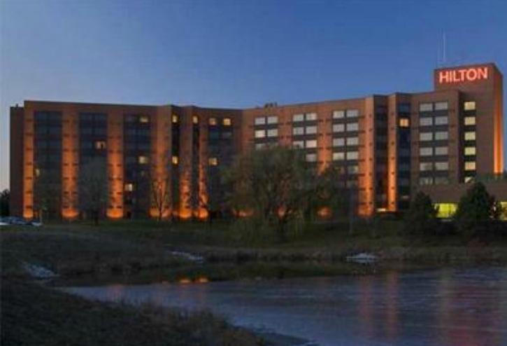The owners of the Hilton Lisle Napervillle are accused of owing $37M in a loan originated in 2006.