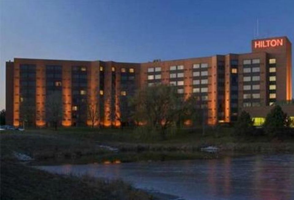 The owners of the Hilton Lisle Napervillle are accused of owing $37M in a loan originated in 2006.