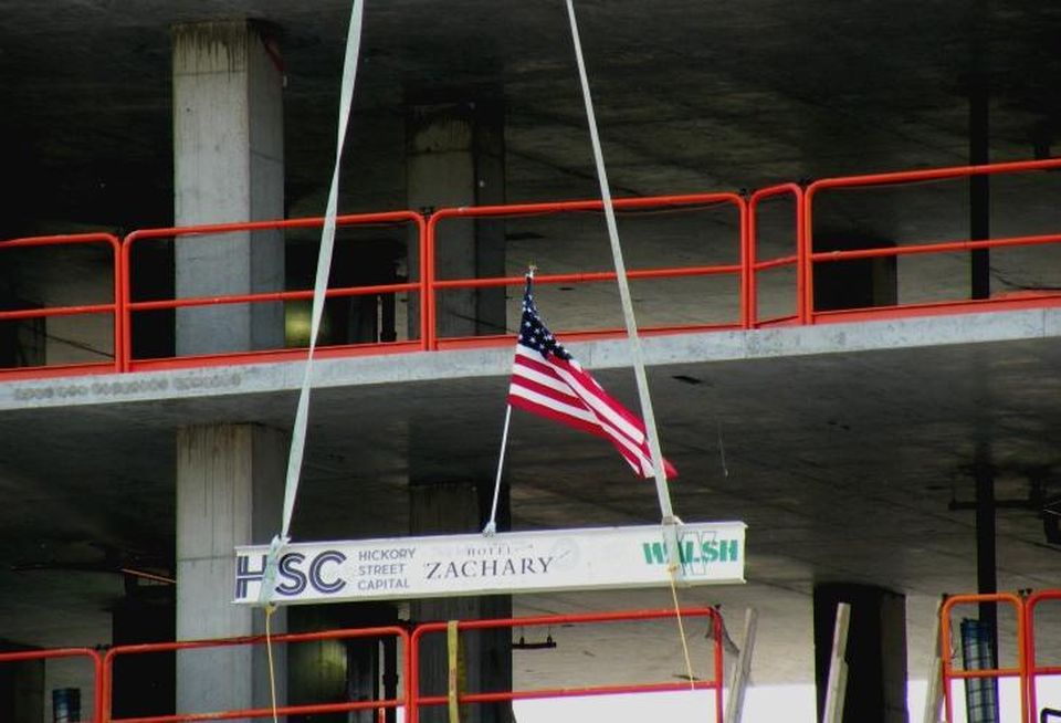 Zachary Hotel topping beam, Chicago