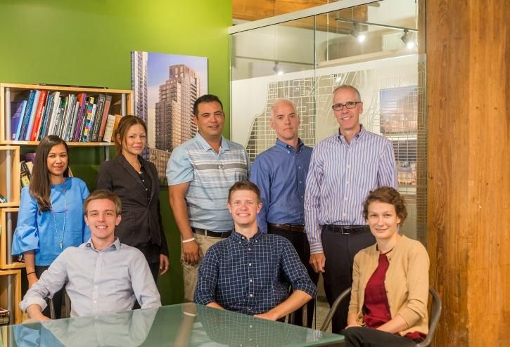 KTGY Architecture + Planning intern Peter Westerfield (center) with members of the KTGY team.