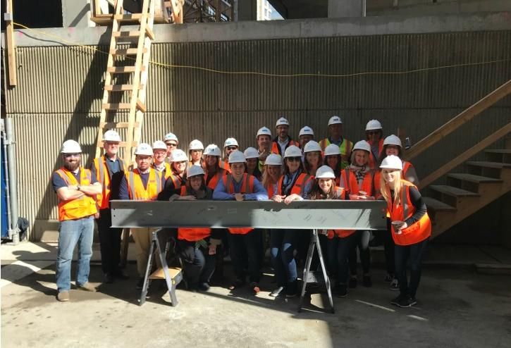 Belgravia Group recently celebrated the topping-off of its 18-story Renelle on the River luxury condominium building with a beam-signing ceremony on site at 403 North Wabash in River North.